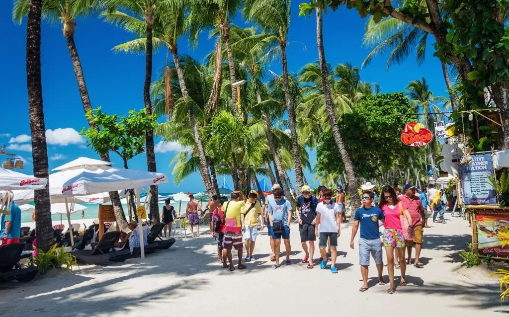main beach busy shop restaurant street in boracay island philippines